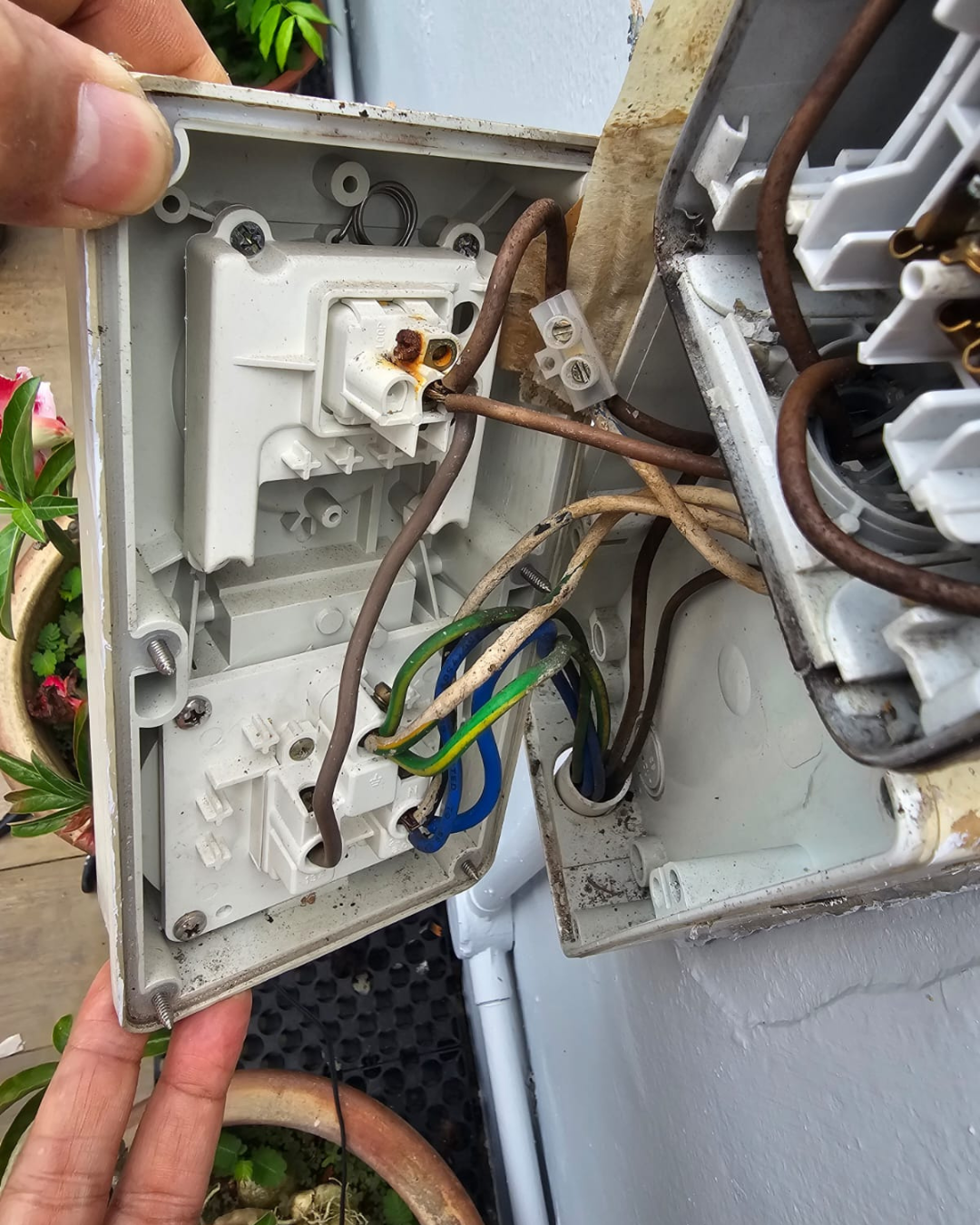 Before photo of faulty power point in Singapore
